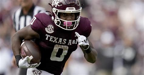 Johnson throws for 249 yards and TD as Texas A&M gets 30-17 win over South Carolina